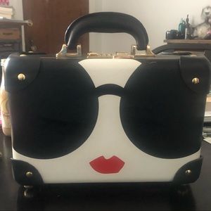 Steamline luggage collab with Alice and Olivia